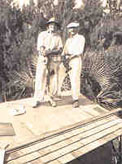 HR Anstis (left) on roof in Jupiter Island